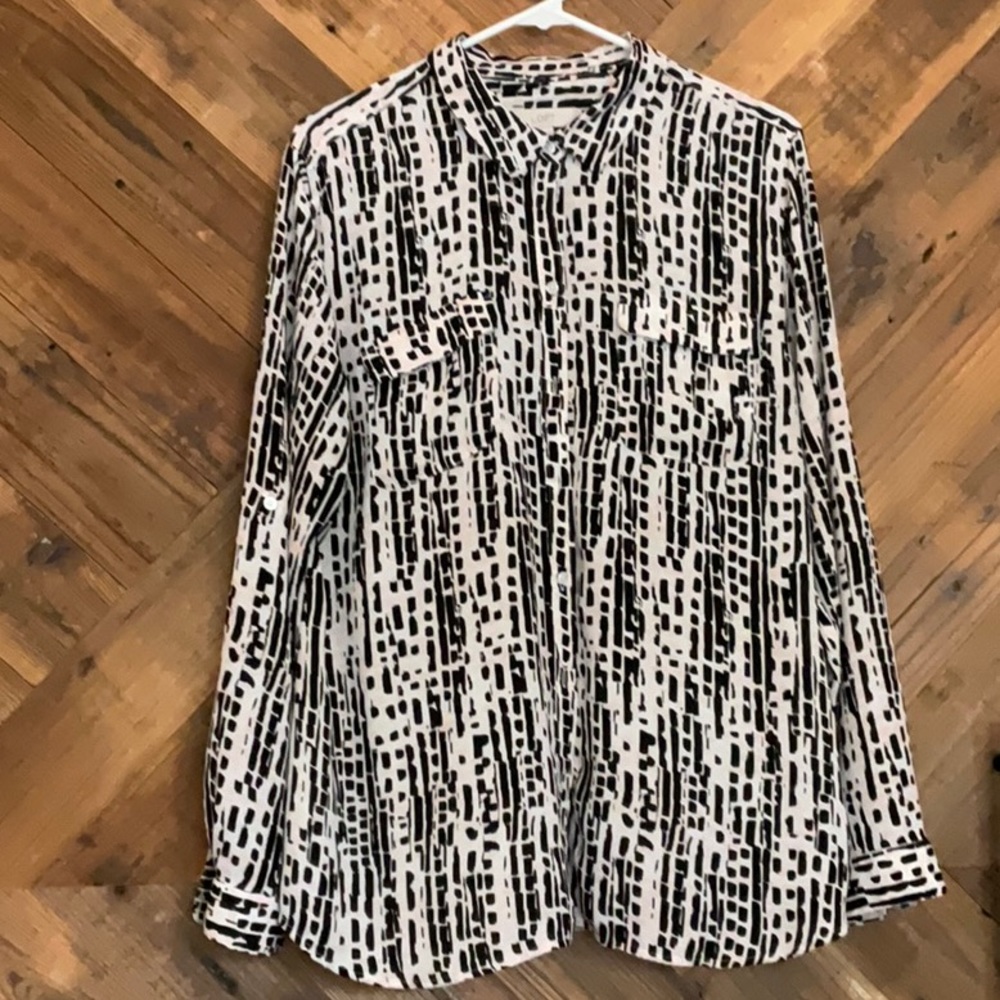Long-sleeve LOFT blouse with geometric pattern.
